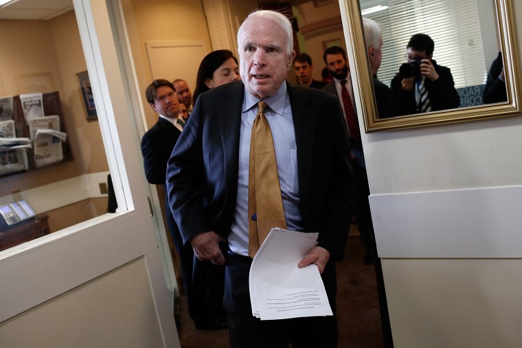 U.S. Sen. John McCain (R-AZ) arrives for a press conference in Washington on March 26, 2015.