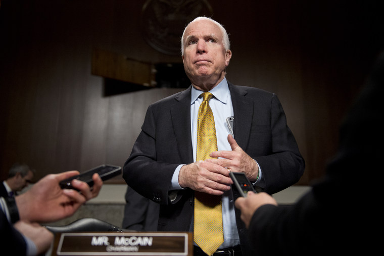 Chairman John McCain, R-Ariz., talks with reporters during a break in a hearing on Feb. 4, 2015, Washington, D.C. (Photo By Tom Williams/CQ Roll Call/Getty)