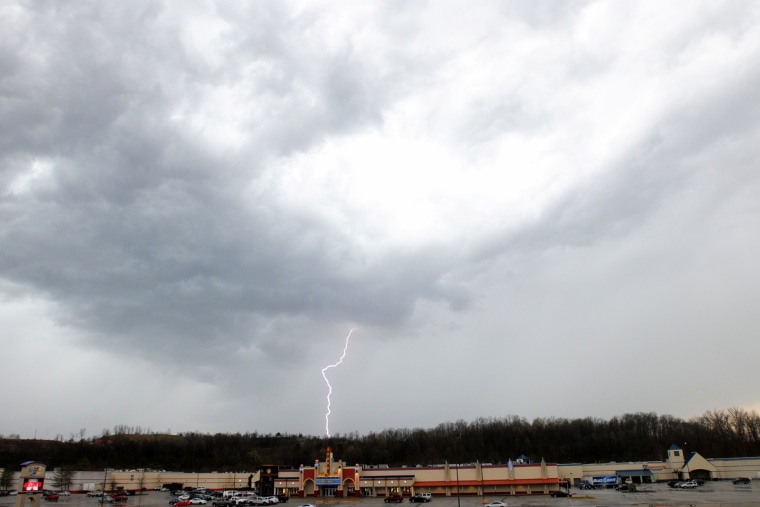 Lightning strikes as a thunderstorm passes over the KYOVA Mall, April 8, 2015, in Cannonsburg, Ky. (Photo by Kevin Goldy/The Independent/AP)