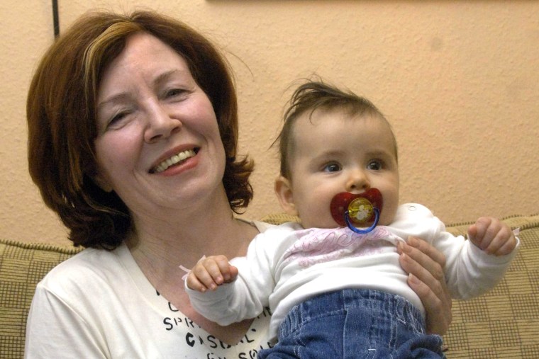 An archive picture made available on April 12, 2015 of then 55-year-old Annegret Raunigk (L) posing with her daughter Leila in Berlin, Germany on Nov. 2, 2005. (Photo by Patrick Lux/EPA)