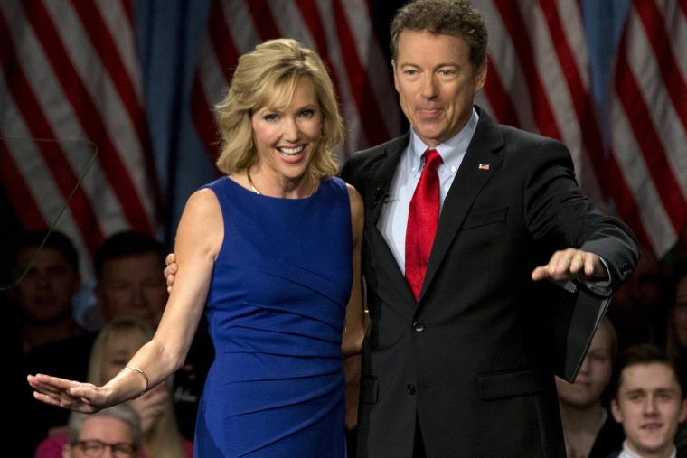 Sen. Rand Paul, R-Ky., joined by his wife Kelley Ashby, arrives to announce the start of his presidential campaign on April 7, 2015, in Louisville, Ky.