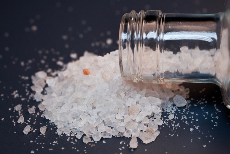 A synthetic drug known as \"bath salts, \" spills out of a bottle in an image released by the Drug Enforcement Agency. Flakka and bath salts are both abused synthetic drugs, and part of a chemical class called cathinones, but the effects of flakka are far stronger.