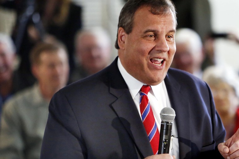 New Jersey Gov. Chris Christie, R-N.J. takes a questions during a town hall meeting with area residents in Londonderry, N.H., on April 15, 2015. (Photo by Jim Cole/AP)
