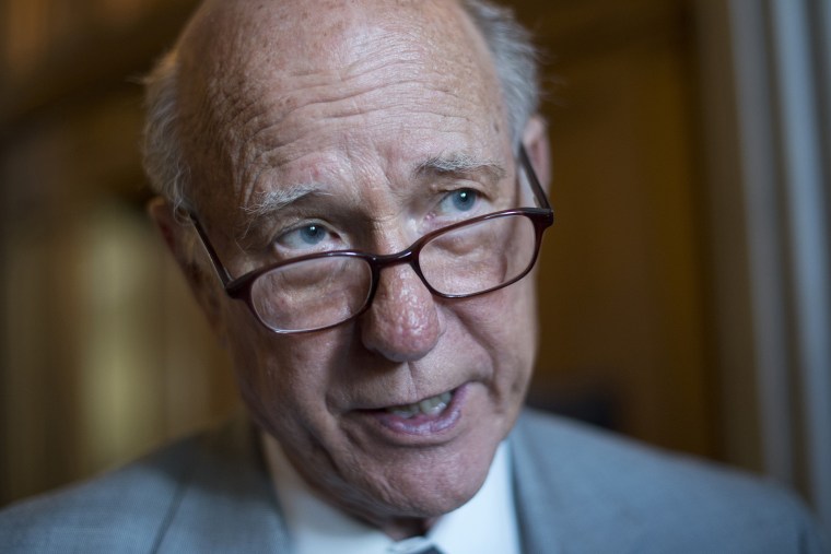 Sen. Pat Roberts, R-Kan., talks with reporters before a Senate luncheon at the Capitol in 2012.