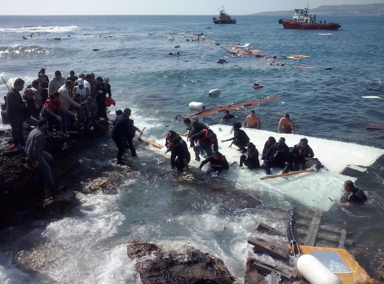 Migrants arrving at Zefyros beach at Rhodes island, Greece on April 20, 2015.