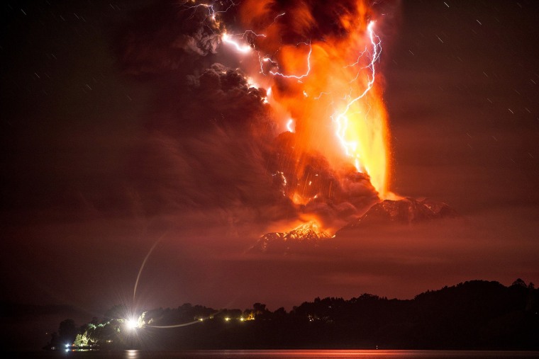 This view from Frutillar, southern Chile, shows a high column of ash and lava spewing from the Calbuco volcano, on April 23, 2015.