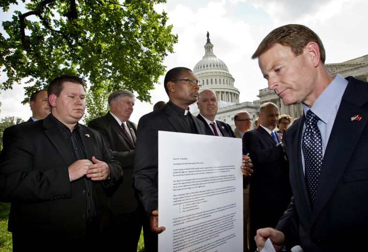 Family Research Council President Tony Perkins finishes his speech denouncing gay marriage as a group of pastors gather on Capitol Hill in Washington, May 24, 2012, to show their support for the Defense of Marriage Act. (Photo by J. Scott Applewhite/AP)