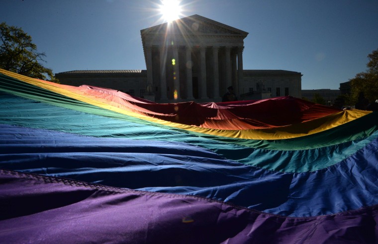 Supporters of same-sex marriages gather outside the US Supreme Court on April 28, 2014 in Washington, DC.