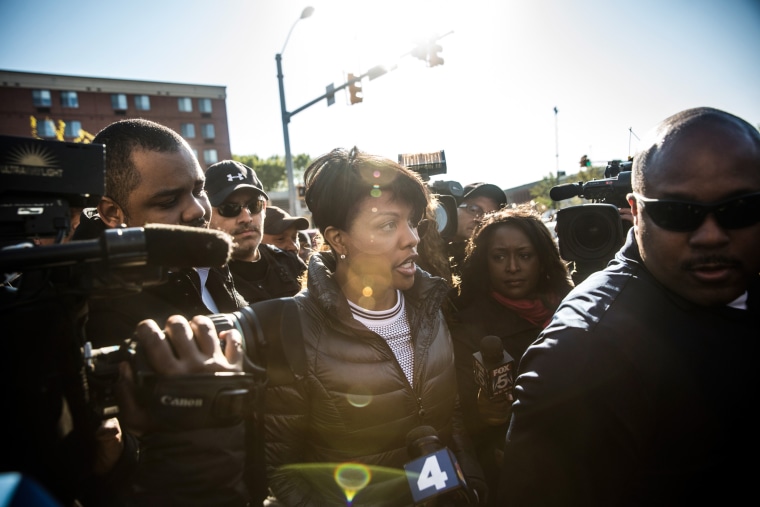 Baltimore Mayor Stephanie Rawlings-Blake speaks to community members and the media near the site of a destroyed CVS pharmacy after riots broke out on Monday after the funeral of Freddie Gray, on April 28, 2015 in Baltimore, Md. (Andrew Burton/Getty)