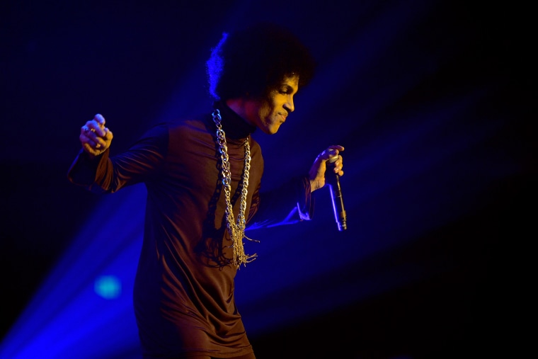 Prince performs onstage at The Hollywood Palladium on March 8, 2014 in Los Angeles, Calif. (Photo by Kevin Mazur/WireImage for NPG Records 2013/Getty)
