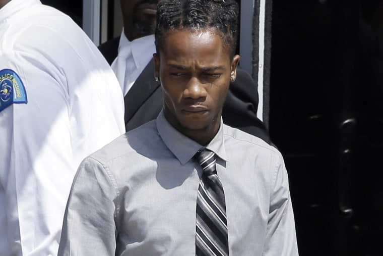 Dorian Johnson leaves Friendly Temple Missionary Baptist Church in St. Louis on Aug. 25, 2014.