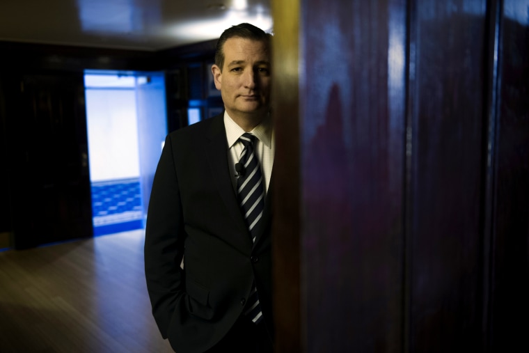 Republican presidential candidate Sen. Ted Cruz, R-Texas waits to be announced to speak at the Hispanic Chamber of Commerce (USHCC) meeting, April 29, 2015, at the National Press Club in Washington. (Photo by Cliff Owen/AP)