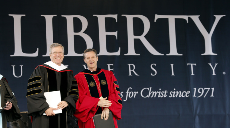 Former Florida Gov. Jeb Bush on stage with Liberty University president Jerry Falwell Jr. for commencement ceremonies in Williams Stadium in Lynchburg, Va., May 9, 2015. (Photo by Steve Helber/AP)
