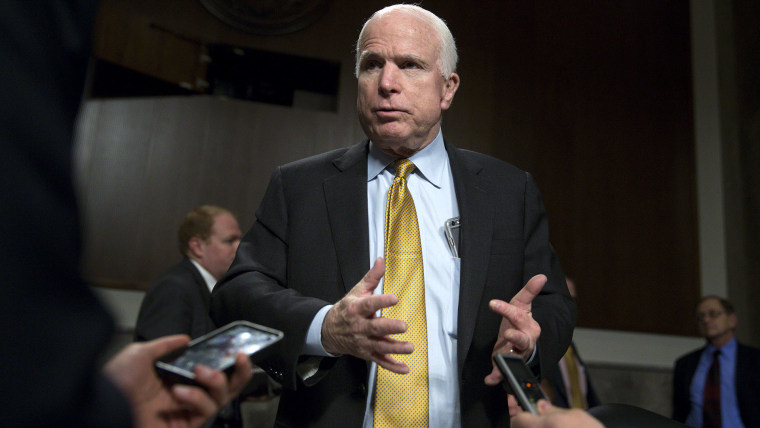 Senator John McCain (R-Ariz.) speaks to reporters during a hearing in Washington, D.C., on Feb. 4, 2015. (Photo by Bloomberg/Getty)