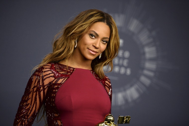 Beyonce poses with her Video Vanguard Award in the press room at the MTV Video Music Awards at The Forum on Aug. 24, 2014, in Inglewood, Calif. (Photo by Jordan Strauss/Invision/AP)