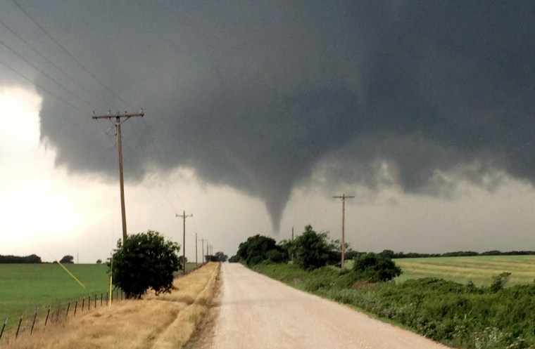 A tornado touches down in Cisco, Texas, May 9, 2015. (Photo by Brian Khoury/AP)