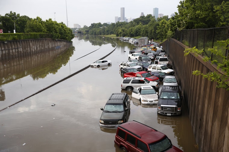 Motorists are stranded along I-45 along North Main in Houston after storms flooded the area, Tuesday, May 26, 2015. Overnight heavy rains caused flooding closing some portions of major highways in the Houston area. (Cody Duty/Houston Chronicle/AP)