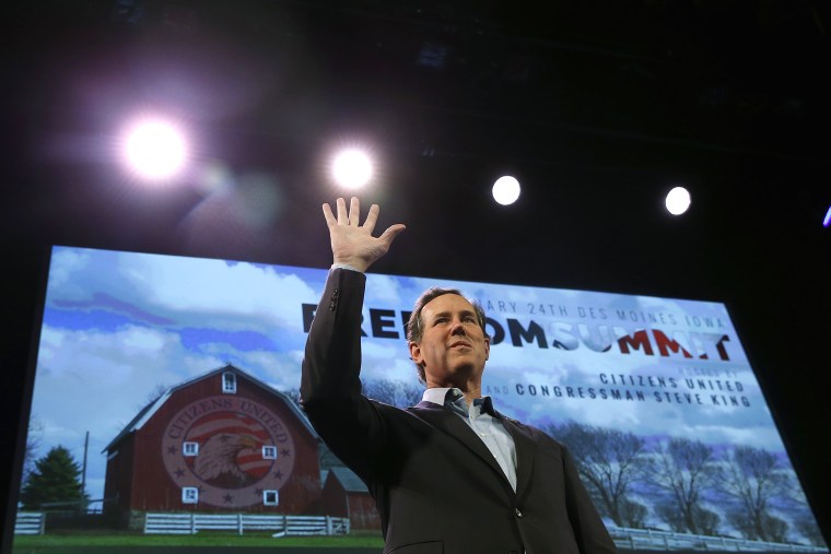 Former U.S. Senator Rick Santorum (R-PA) waves after speaking at the Freedom Summit in Des Moines, Iowa, January 24, 2015. (Photo by Jim Young/Reuters)