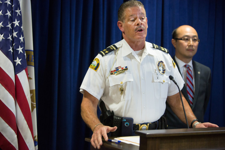 St. Paul Police Chief Tom Smith and Ramsey County Attorney John Choi announce criminal charges against the Archdiocese of Saint Paul and Minneapolis during a news conference on June 5, 2015 in St. Paul. (Jennifer Simonson/Minnesota Public Radio/AP)