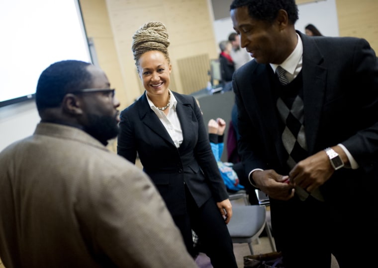 Rachel Dolezal, Spokane's NAACP President, meets with Joseph M. King of King's Consulting, left, and Dr. Scott Finnie, director and senior prof. of EWU's Africana Education Program, Jan. 16, 2015. (Photo by Tyler Tjomsland/The Spokesman-Review/AP)