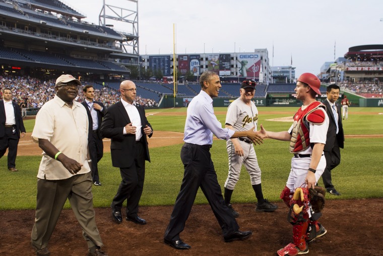 President Barack Obama greets members of the Republican team during the annual Congressional Baseball Game between the Democrats and Republicans in Congress at Nationals Park in Washington, D.C., June 11, 2015. (Photo by Saul Loeb/AFP/Getty)