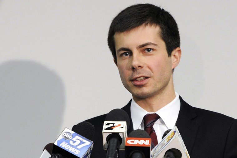 In this March 18, 2013 file photo, South Bend Mayor Peter Buttigieg speaks to reporters about a plane crash in South Bend, Ind. (Photo by Joe Raymond/AP)