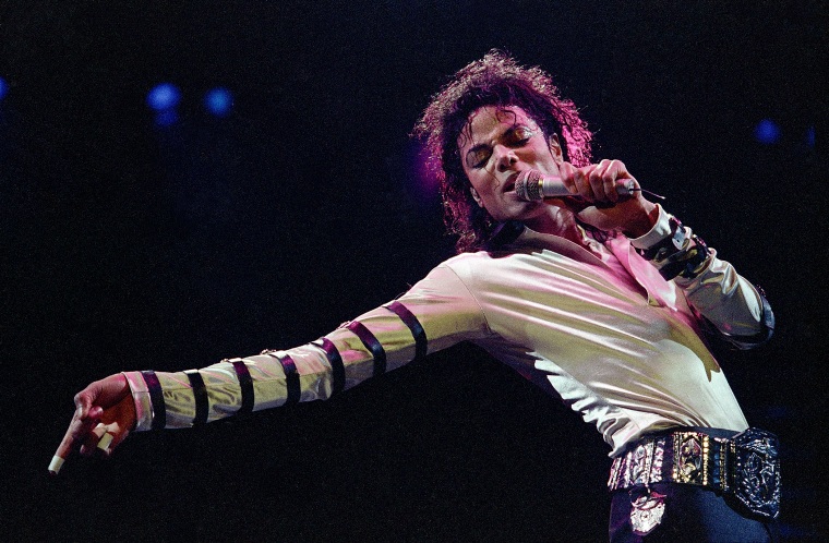 Michael Jackson performs during his 13-city U.S. tour in Kansas City, Mo., Feb. 24, 11988. (Photo by Cliff Schiappa/AP)