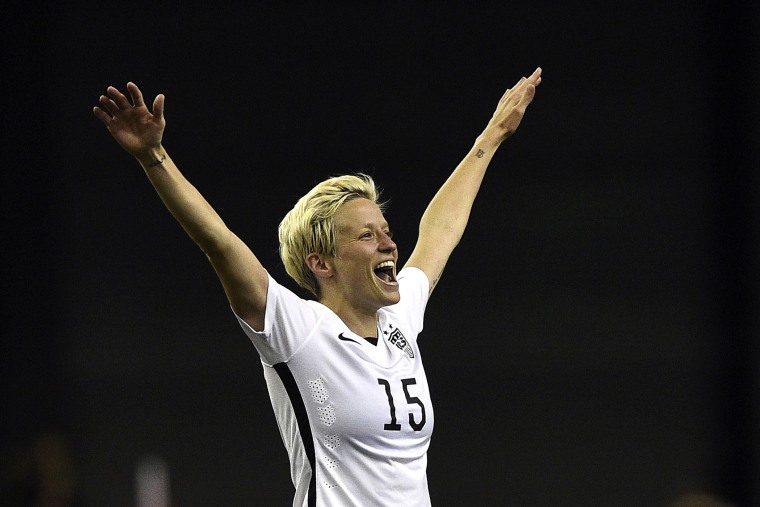 USA midfielder Megan Rapinoe celebrates after winning the semi-final football match between USA and Germany during their 2015 FIFA Women's World Cup at the Olympic Stadium in Montreal on June 30, 2015. (Photo by Franck Fife/AFP/Getty)