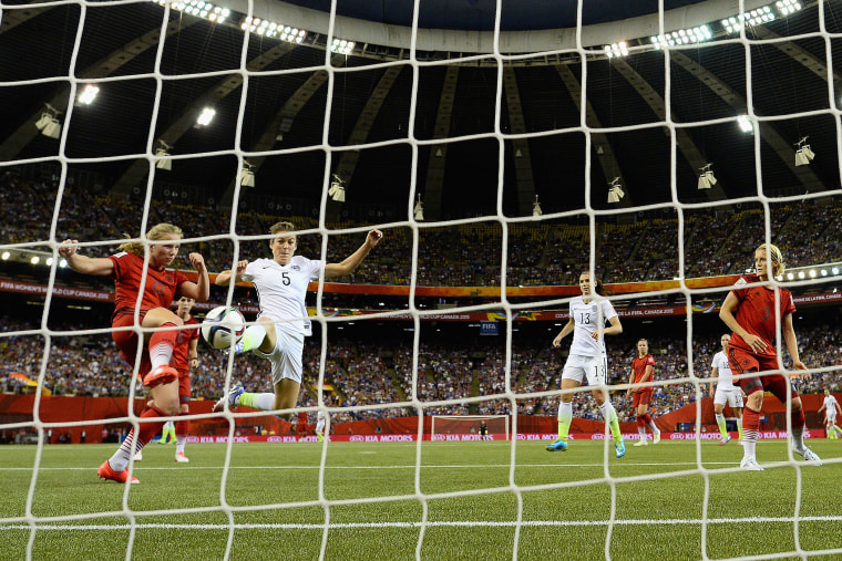 Kelley O'Hara of the United States scores the second goal past Tabea Kemme of Germany in the FIFA Women's World Cup 2015 Semi-Final Match at Olympic Stadium on June 30, 2015 in Montreal, Canada. (Photo by Dennis Grombkowski/Bongarts/Getty)