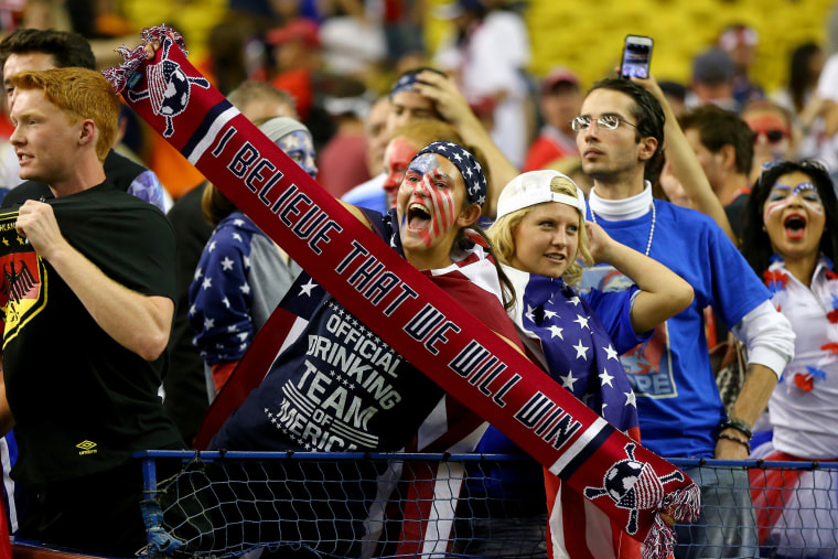 Fans of the United States celebrate after the USA 2-0 victory against Germany in the FIFA Women's World Cup 2015 Semi-Final Match at Olympic Stadium on June 30, 2015 in Montreal, Canada. (Photo by Elsa/Getty)