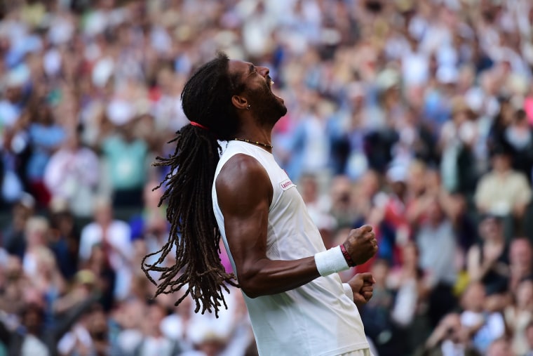 Dustin Brown of Germany celebrates victory over Rafael Nadal of Spain during day four of the Wimbledon Lawn Tennis Championships on July 02, 2015 in London, England. (Photo by Alex Broadway/Anadolu Agency/Getty)