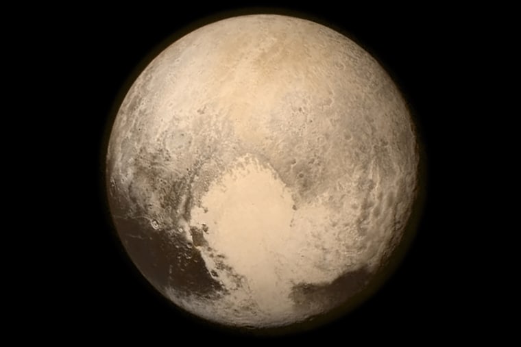 A handout picture made available by NASA shows Pluto nearly filling the frame in the Long Range Reconnaissance Imager (LORRI) aboard NASA's New Horizons spacecraft, taken on July 13, 2015. (Photo by NASA/APL/SWRI/EPA)