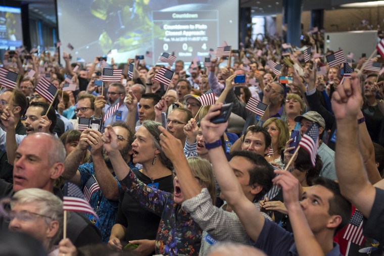 New Horizons Pluto Flyby (Courtesy of Bill Ingalls/NASA).