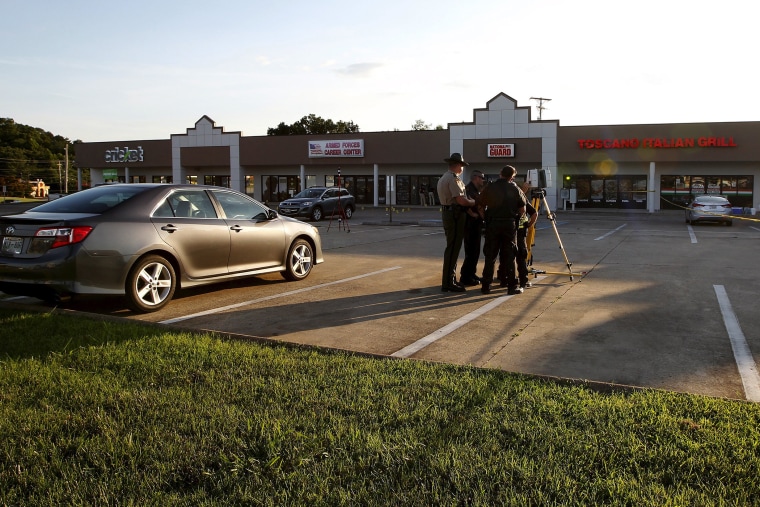 FBI agents and local police work the scene at the Armed Forces Career Center in Chattanooga, Tenn., July 16, 2015. (Photo by Tami Chappell/Reuters)