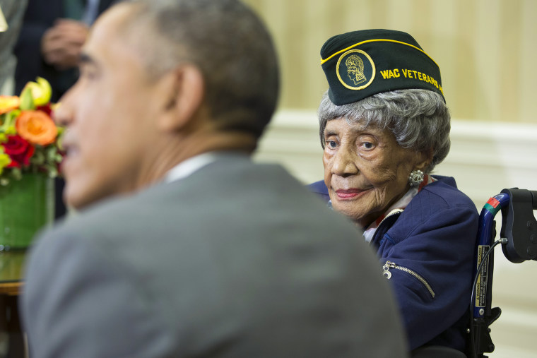 President Barack Obama meets with Emma Didlake, 110, of Detroit, the oldest known World War II veteran on July 17, 2015, in the Oval Office of the White House. (Photo by Evan Vucci/AP)