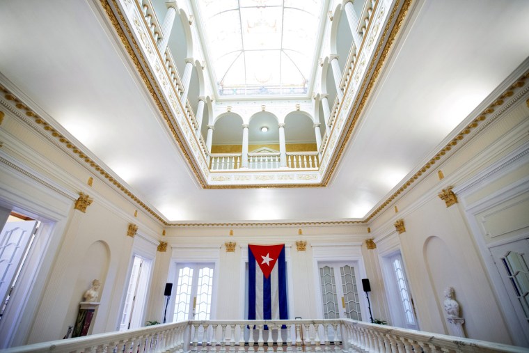 The last Cuban flag that was lowered from the Cuban Embassy in Washington on January 3, 1961, is seen hanging in the new embassy in Washington, July 20, 2015. (Photo by Andrew Harnik/Pool/Reuters)