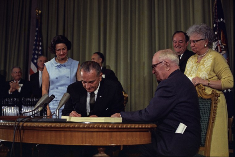 President Lyndon B. Johnson signs the Medicare Bill, July 30, 1965. (Photo by White House Press Office/Archivio GBB/Agenzia Contrasto/Redux)