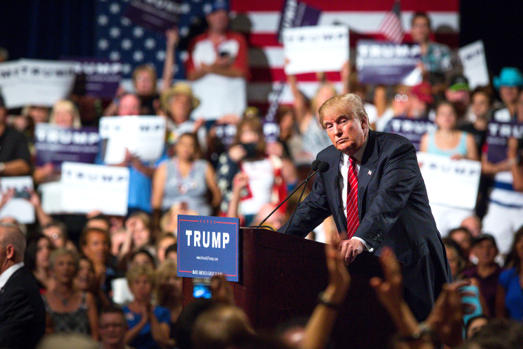 Republican Presidential candidate Donald Trump addresses supporters during a political rally at the Phoenix Convention Center on July 11, 2015 in Phoenix, Ariz. (Photo by Charlie Leight/Getty)