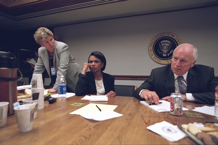 Counselor to the President Karen Hughes looks on at left. (Photo by David Bohrer/National Archives)