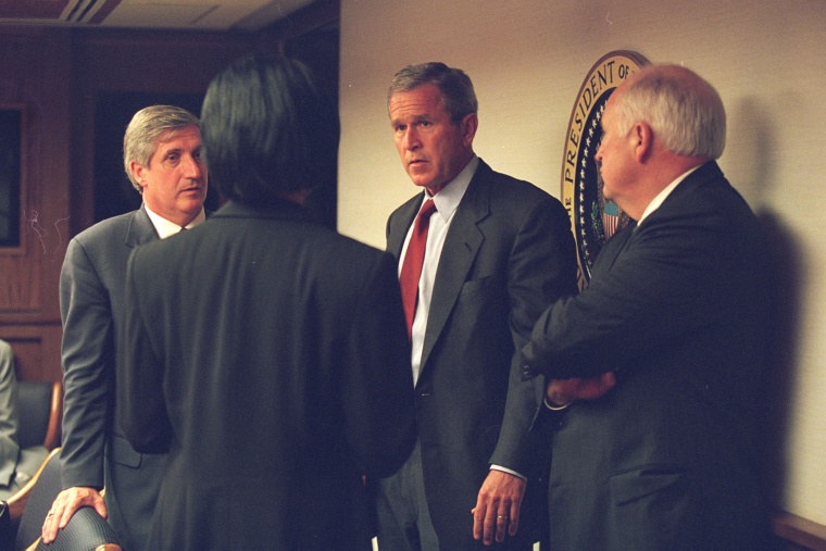 President George W. Bush talks with Cheney, National Security Advisor Condoleezza Rice and White House Chief of Staff Andrew Card at the President's Emergency Operations Center (PEOC) on Sept. 11, 2001. (Photo by David Bohrer/National Archives)