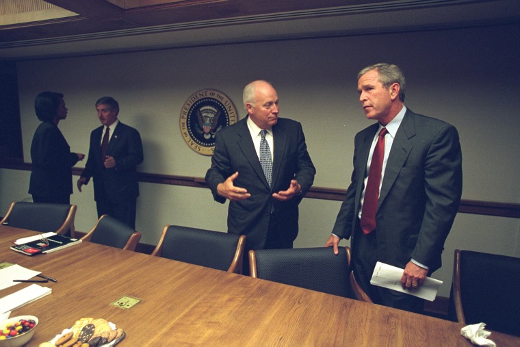 President Bush talks with Vice President Cheney. (Photo by David Bohrer/National Archives)