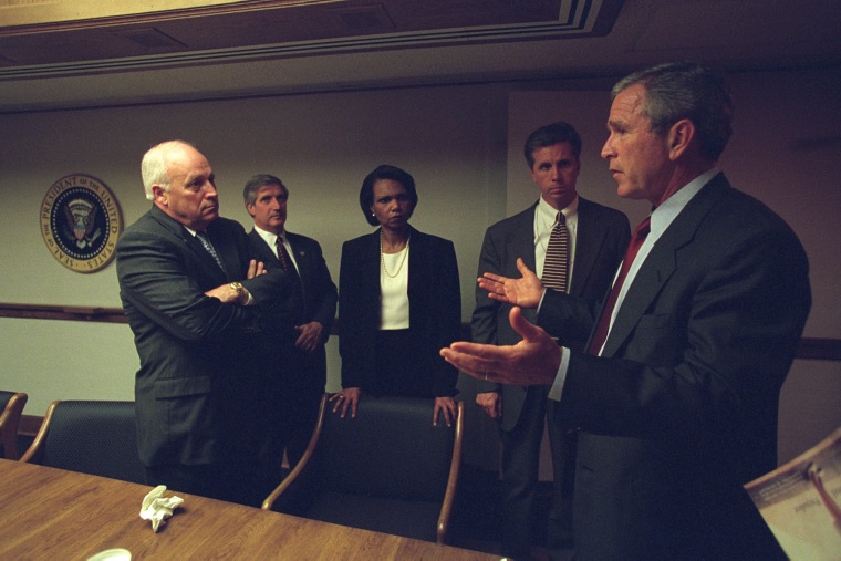 President Bush talks with Vice President Cheney. (Photo by David Bohrer/National Archives)