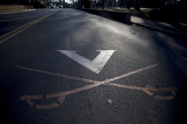 The University of Virginia (UVA) is displayed on University Avenue next to the UVA campus in Charlottesville, Va. on Jan. 17, 2015. (Photo by Andrew Harrer/Bloomberg/Getty)