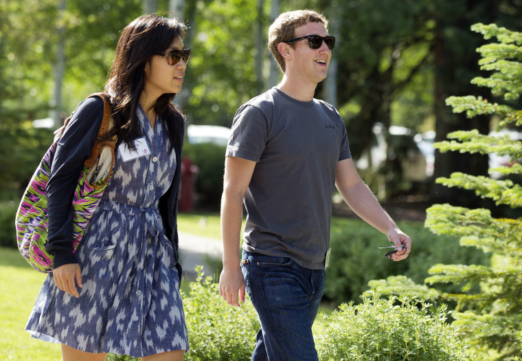 Mark Zuckerberg and wife Priscilla Chan (Photo by Julie Jacobson/AP).