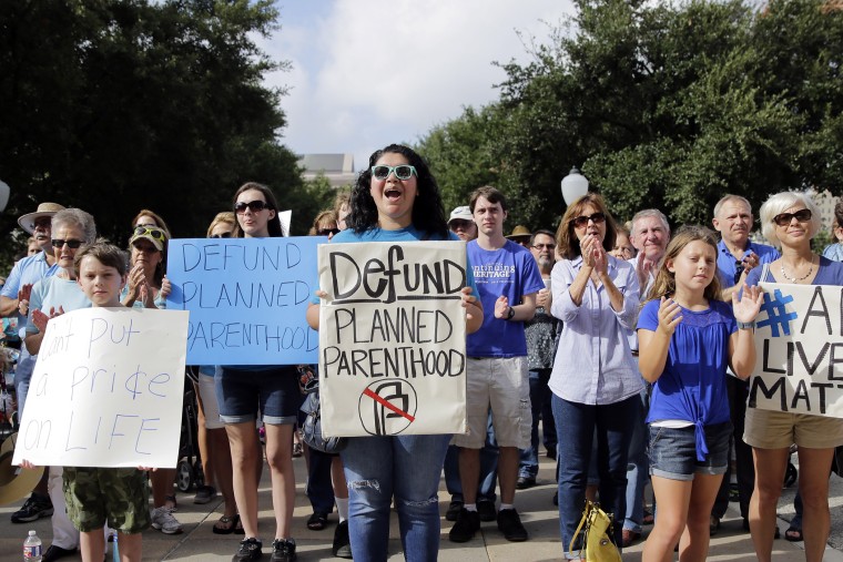 Anti-abortion activists rally on the steps of the Texas Capitol to condemn the use in medical research of tissue samples from aborted fetuses, on July 28, 2015, in Austin, Texas. (hoto by Eric Gay/AP).