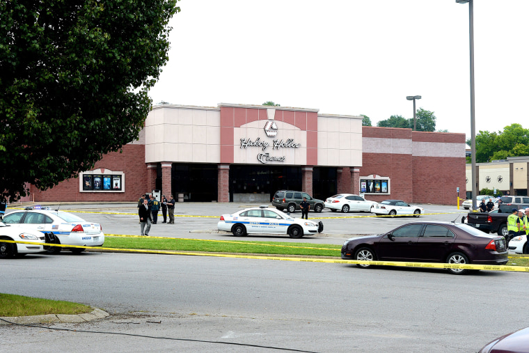 Police work outside Hickory Hollow Cinemas after an unidentified gunman was shot dead on August 5, 2015 in Antioch, Tenn. (Photo by Jason Davis/Getty)