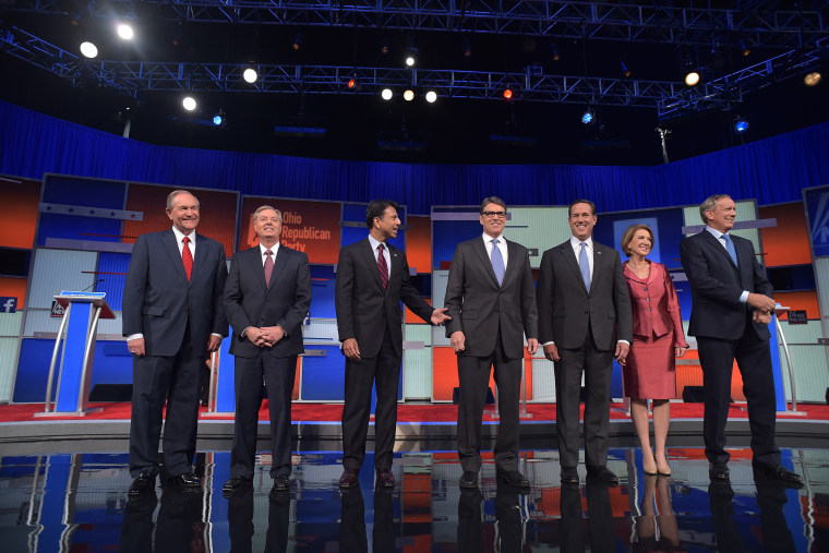 Republican presidential hopefuls arrive on stage for the start of the Republican presidential primary debate on Aug. 6, 2015 at the Quicken Loans Arena in Cleveland, Ohio. (Photo by Mandel Ngan/AFP/Getty)