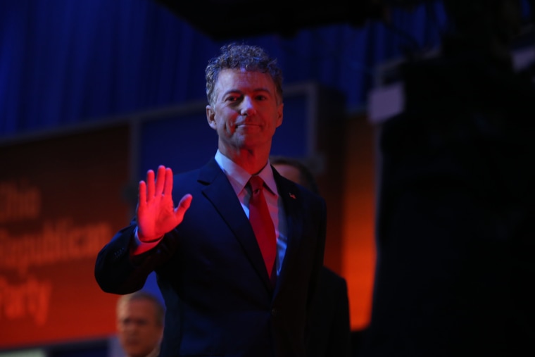 Republican presidential candidate Sen. Rand Paul, R-Ky., waves during the first Republican presidential debate at the Quicken Loans Arena, Aug. 6, 2015, in Cleveland. (Photo by Andrew Harnik/AP)