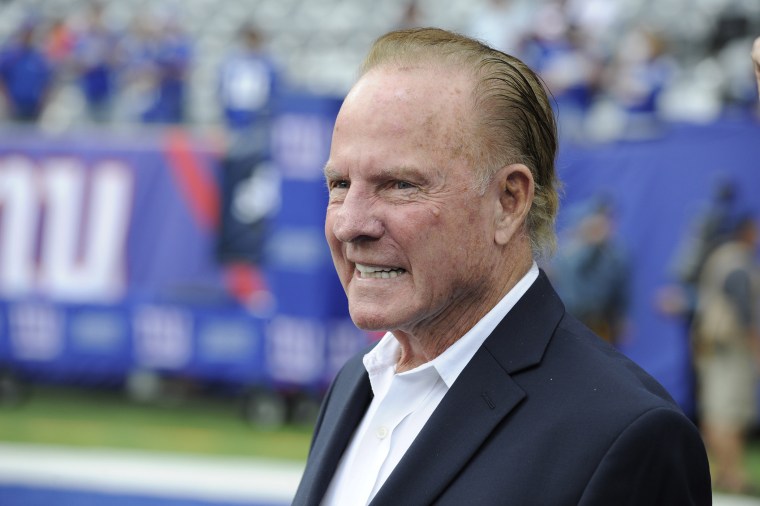 Former New York Giants player Frank Gifford looks on before an NFL football game between the New York Giants and the Denver Broncos, Sept. 15, 2013, in East Rutherford, N.J. (Photo by Bill Kostroun/AP)