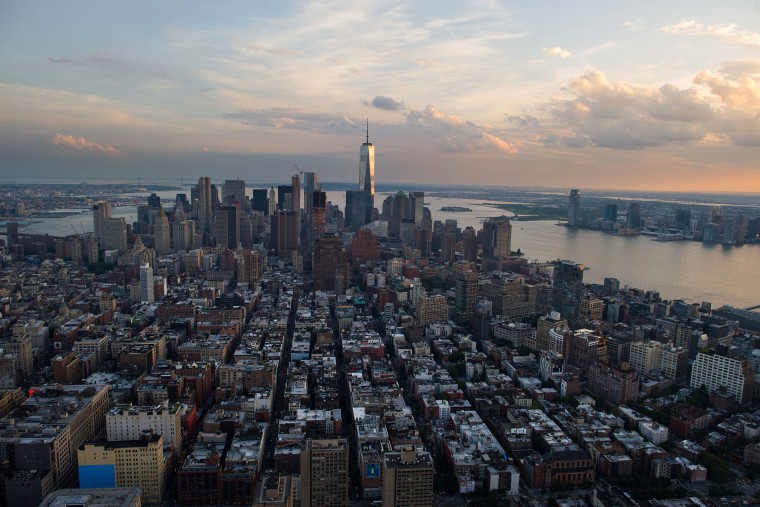 One World Trade Center stands the Lower Manhattan skyline at dusk in this aerial photograph taken above New York, June 19, 2015. (Photo by Craig Warga/Bloomberg/Getty)